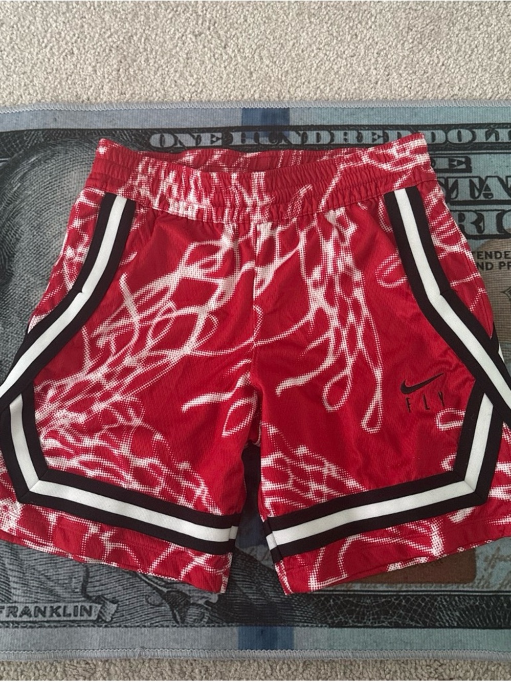 Nike red with white design fly shorts